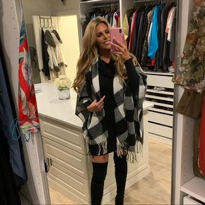 Plaid throw! It lays over your shoulders